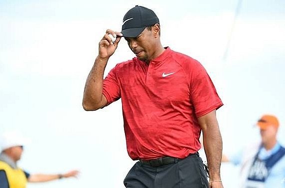 tiger-mcilroy-dang-co-gang-vuon-len